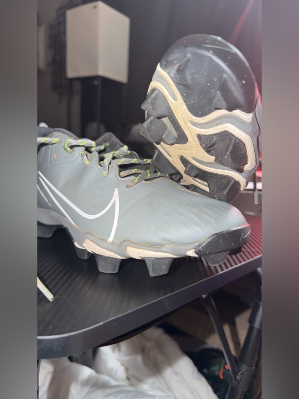 Nike Gray Cleats with White Swoosh and Lime Accents